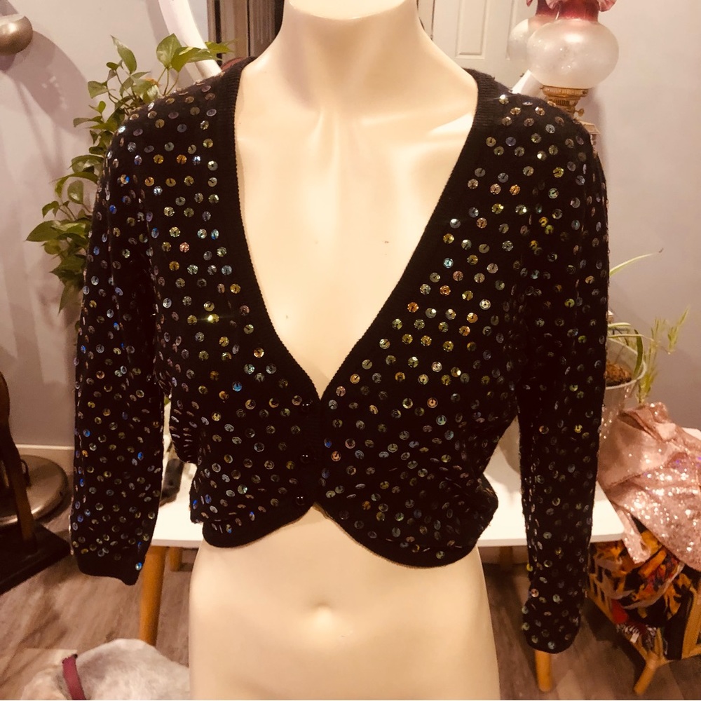 GLIMMER shrug with sparkles